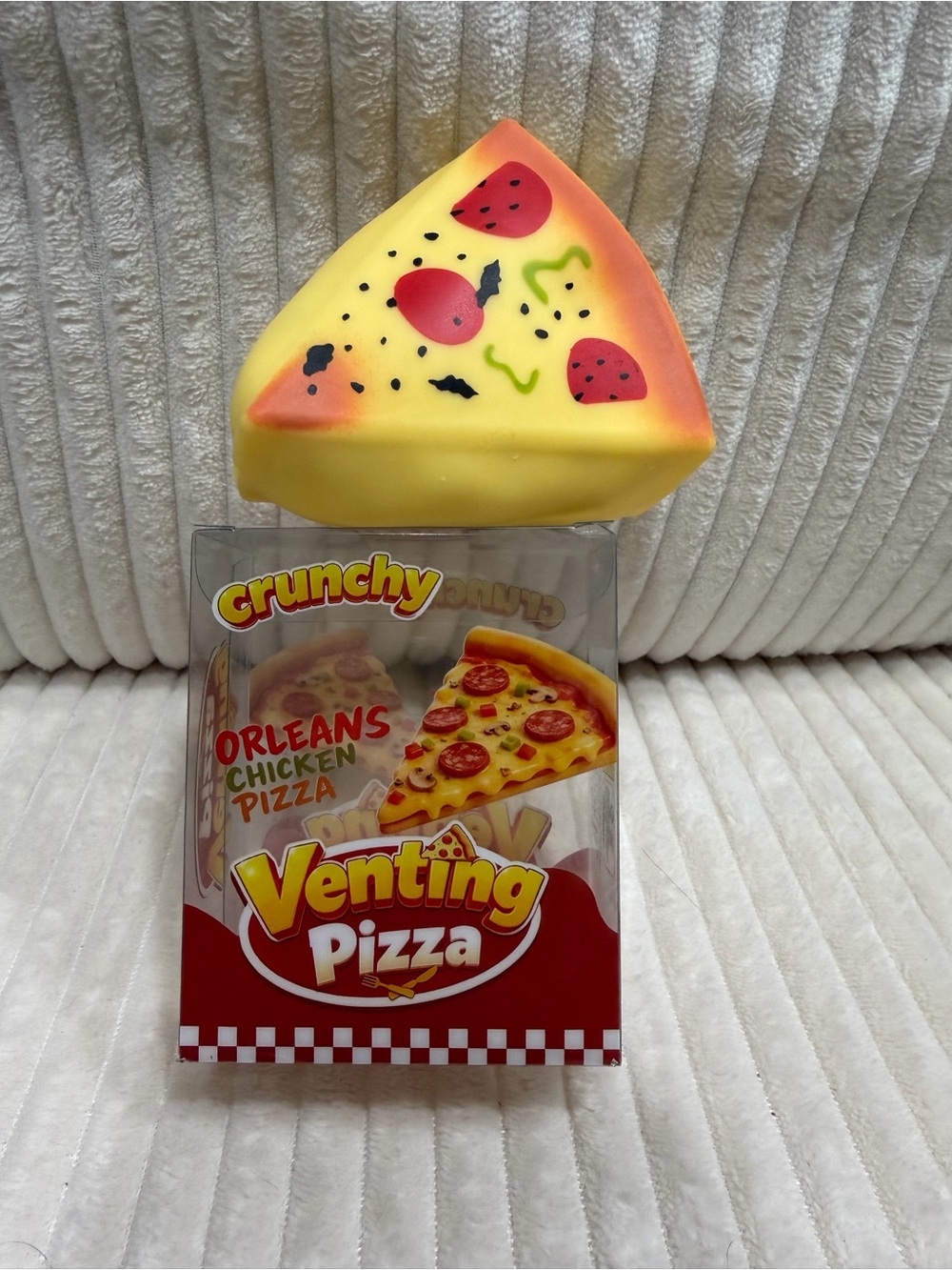 Venting Pizza Slice Squishy Toy - Yellow/Orange. New in package.